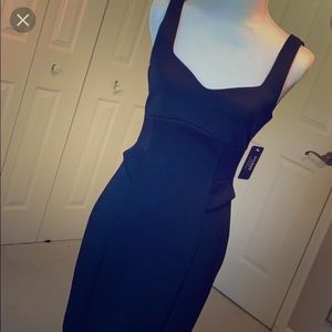 Guess “Bridget” black mini dress